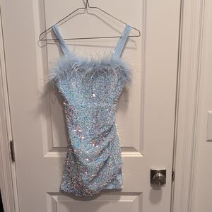 Girls Sparkling Blue Kids Dress with Feather Trim in Size 10